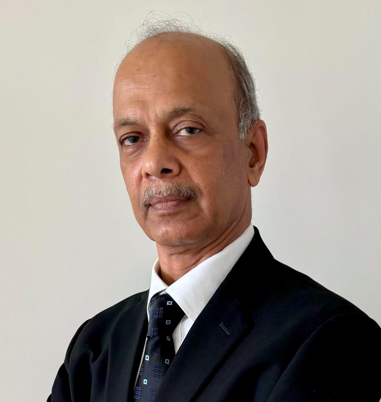 Shri P.K. Pujari, IAS (Retd.)